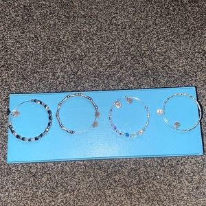 Group of silver alex and ani bracelets